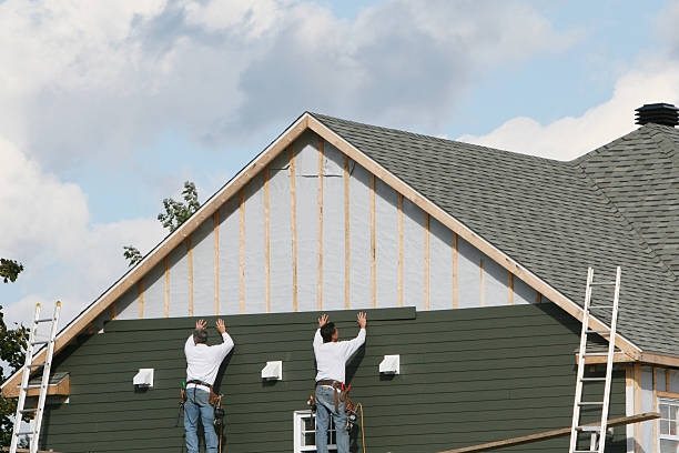 Professional Vinyl Siding technician working in Coal Township, PA